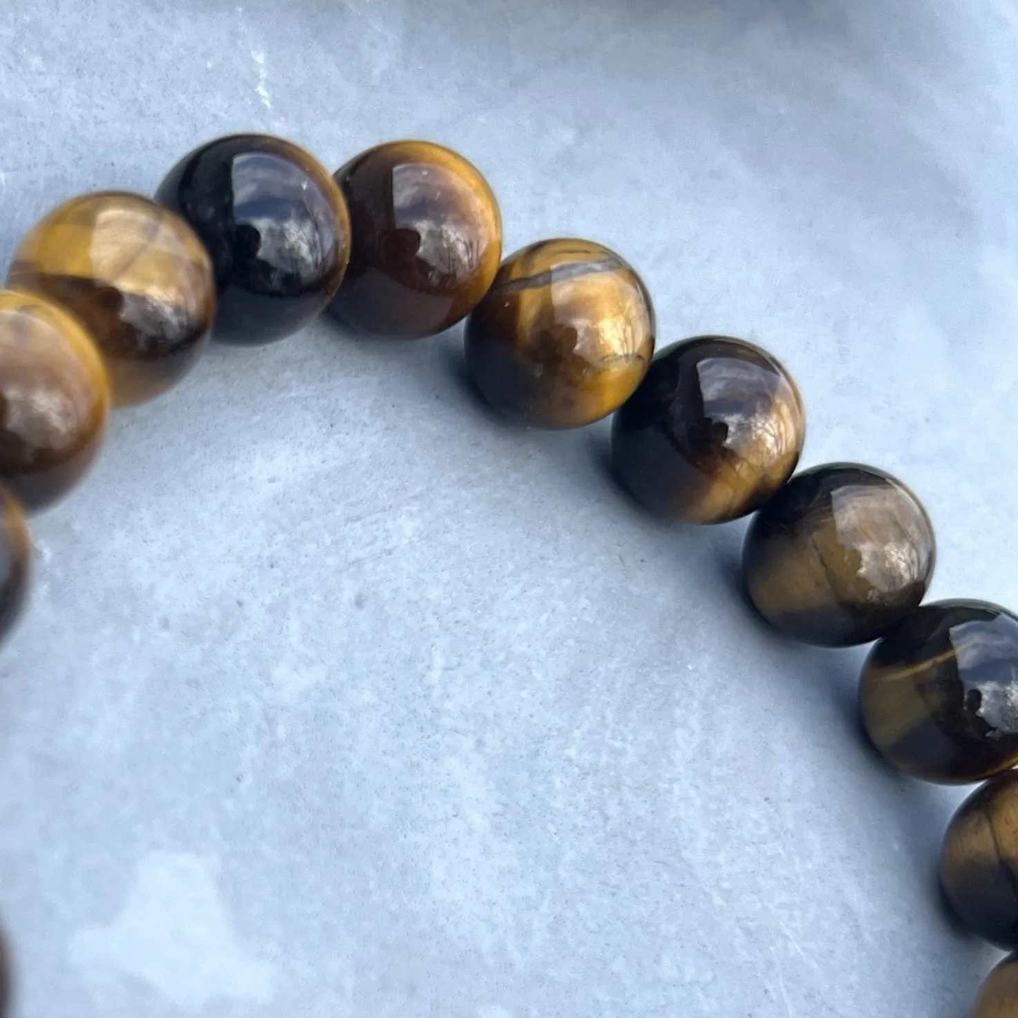 10mm Brown Tiger's Eye Beaded Bracelet with Hematite Accent Bead