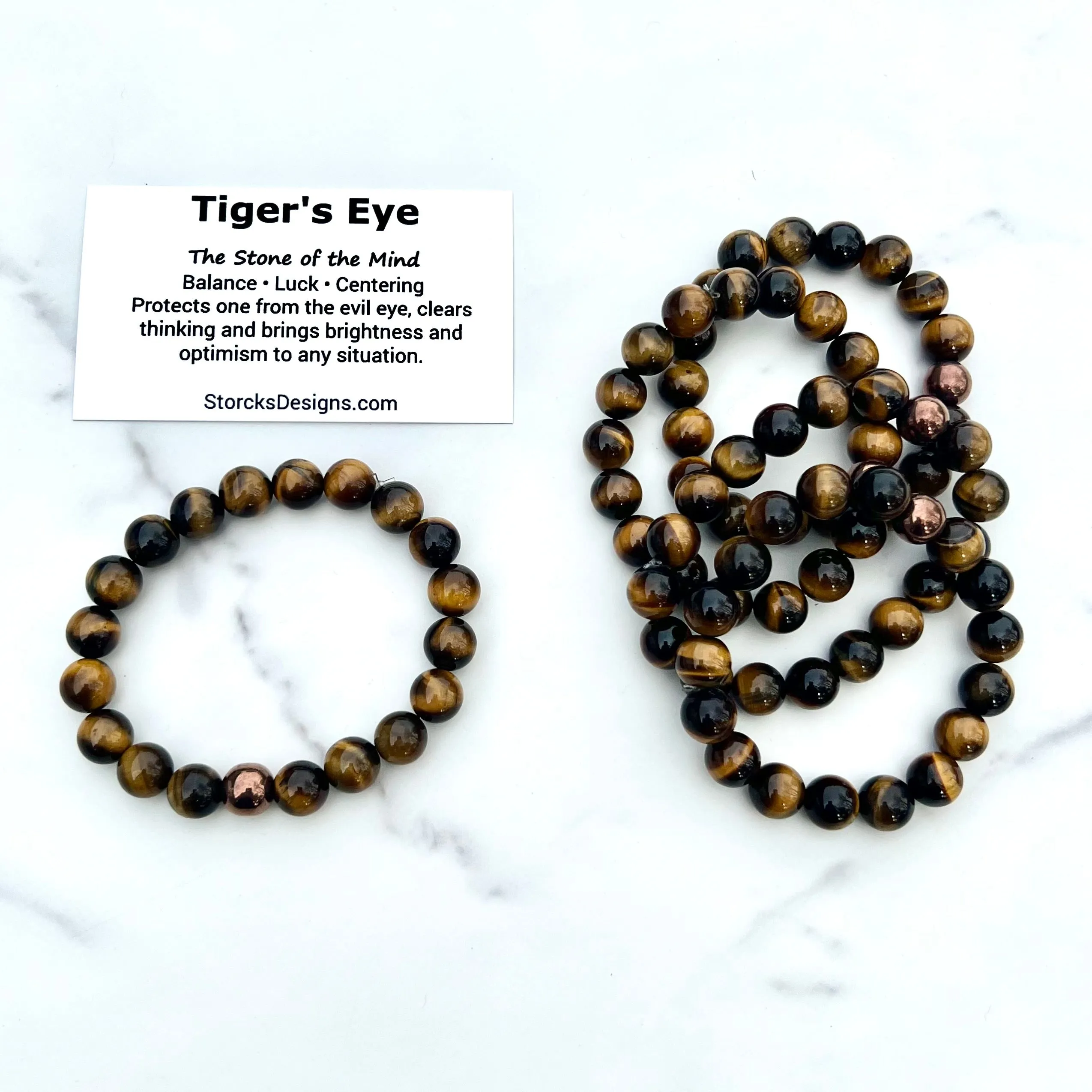 10mm Brown Tiger's Eye Beaded Bracelet with Hematite Accent Bead