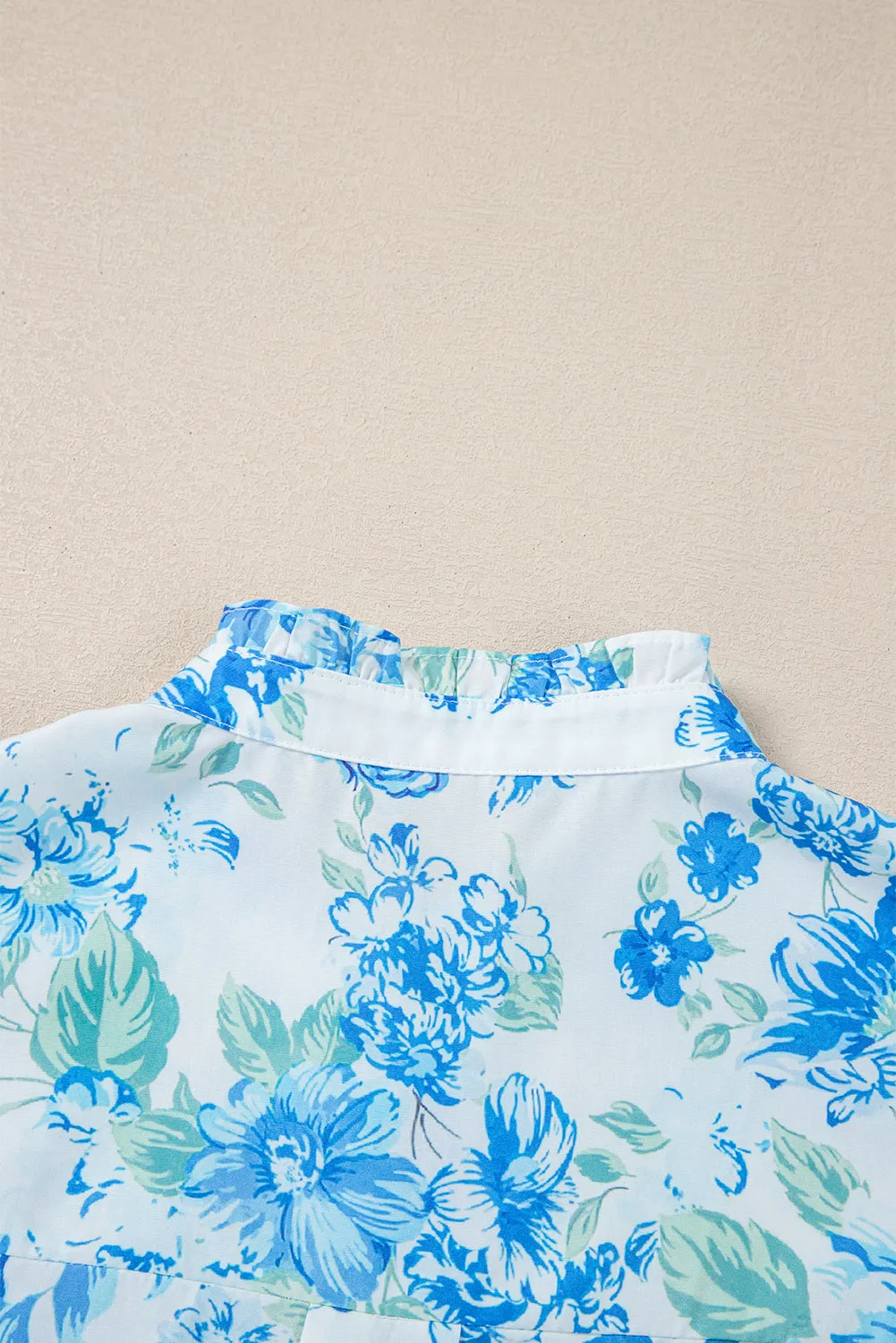 Annabelle. Sky Blue Floral Print Ruffle Sleeve Frill Shirt