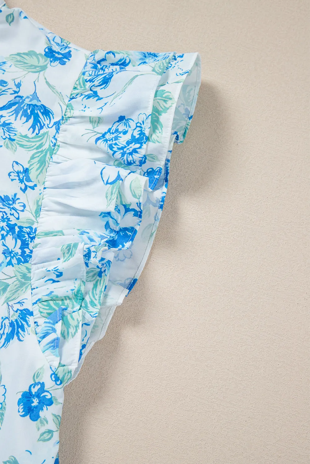 Annabelle. Sky Blue Floral Print Ruffle Sleeve Frill Shirt