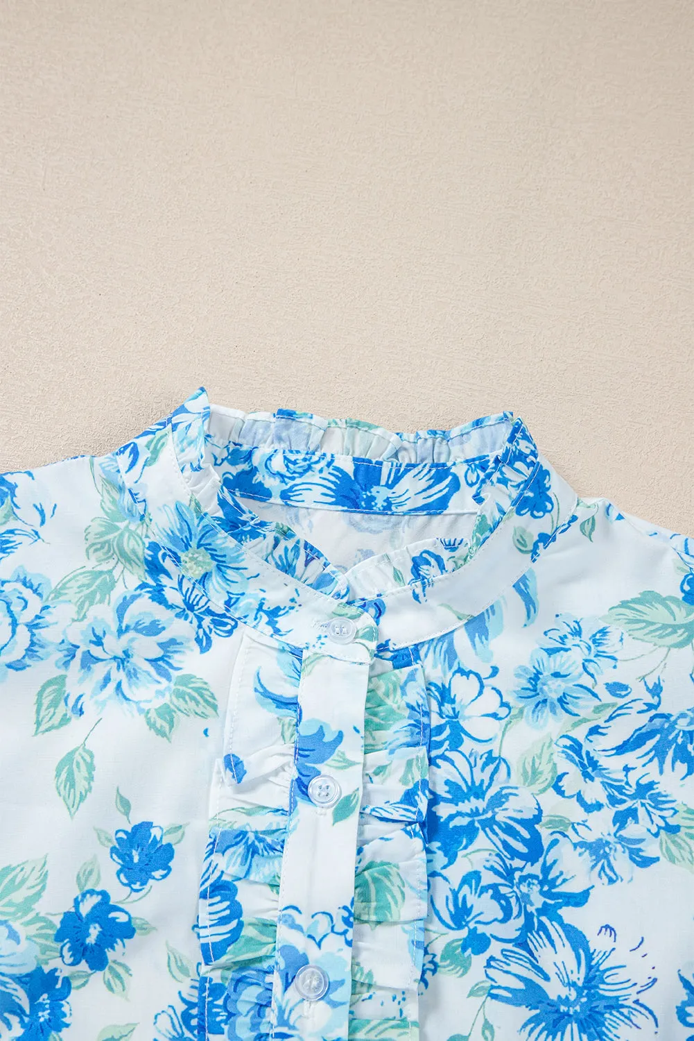 Annabelle. Sky Blue Floral Print Ruffle Sleeve Frill Shirt