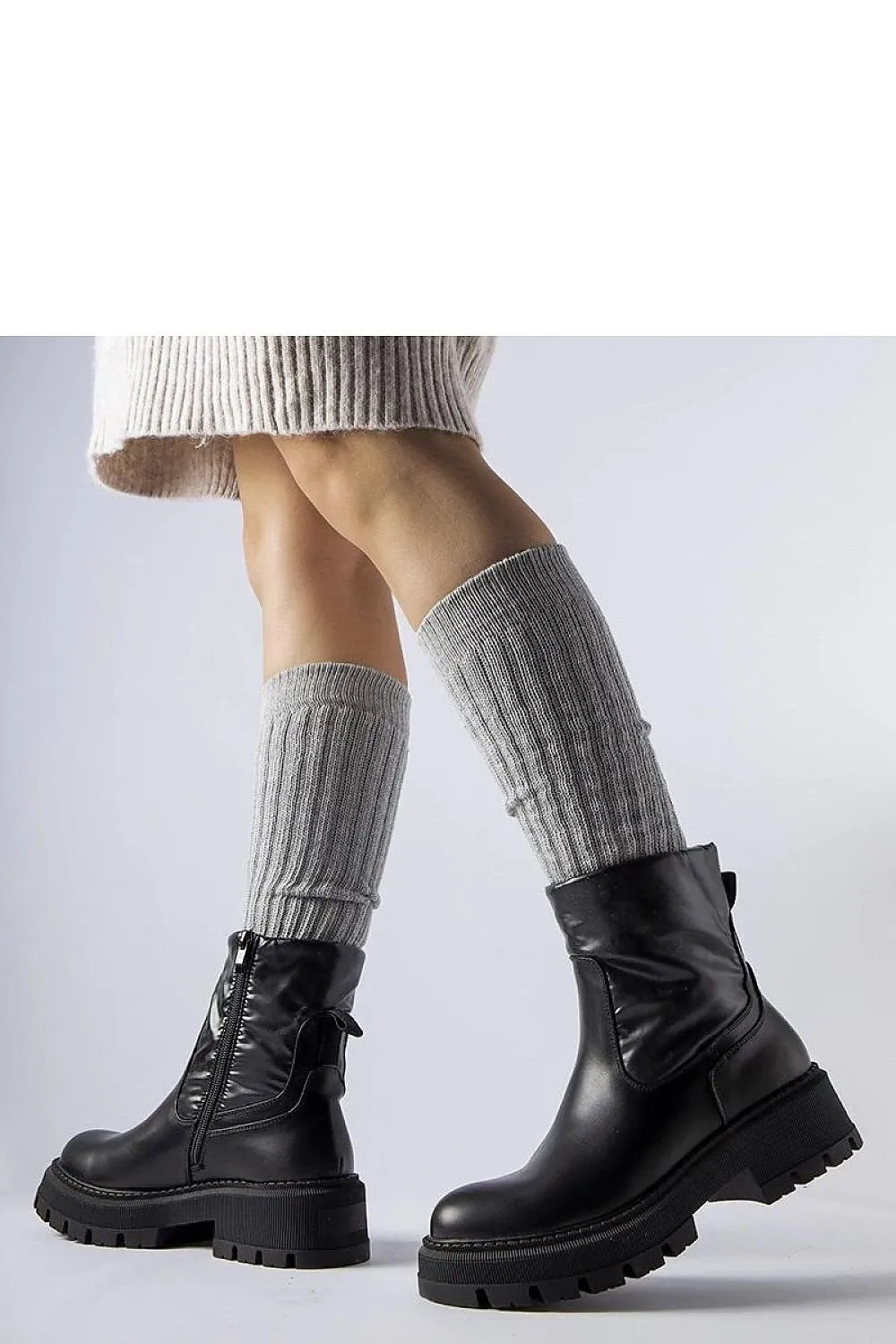 Beige ankle boots with a decorative shaft