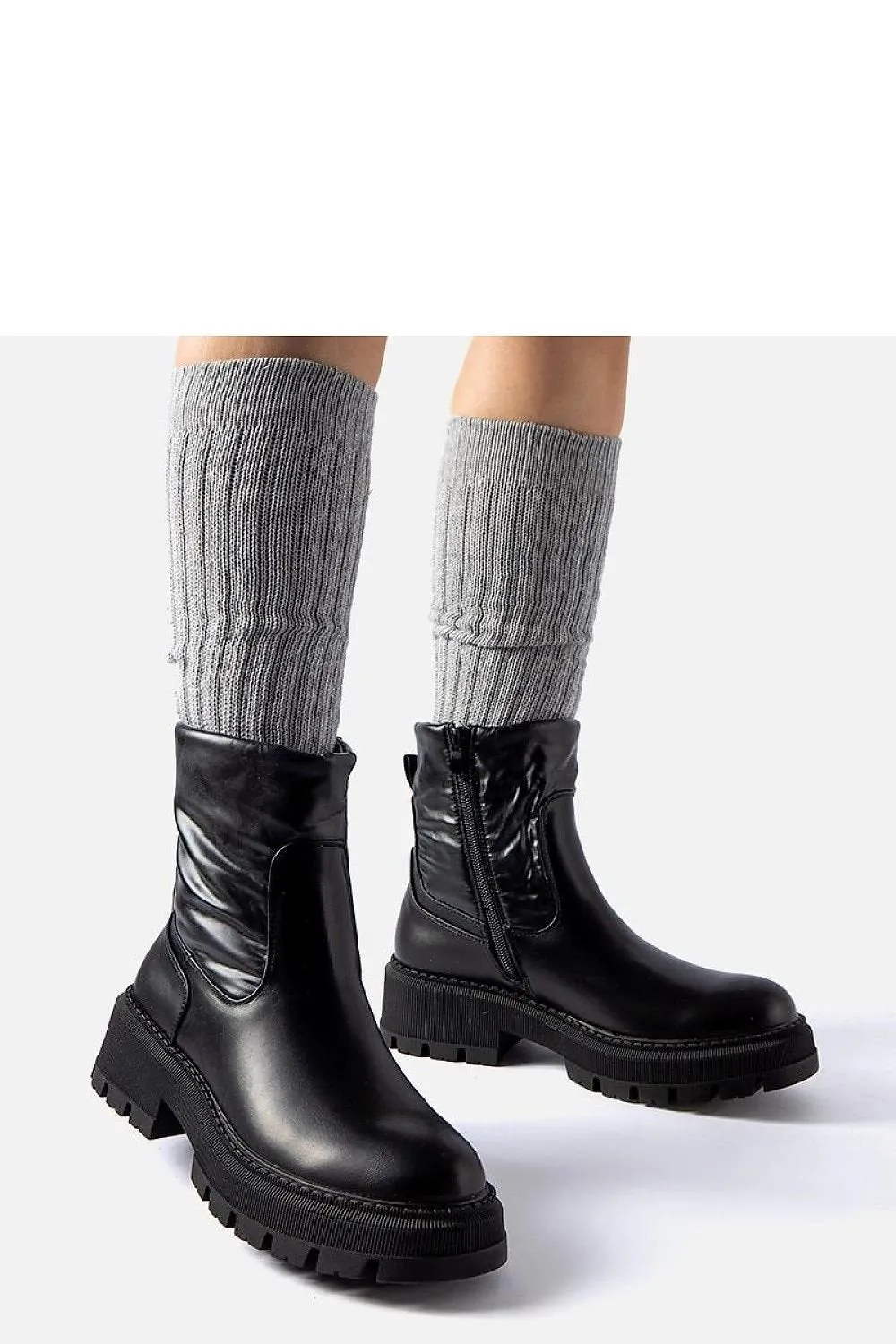 Beige ankle boots with a decorative shaft