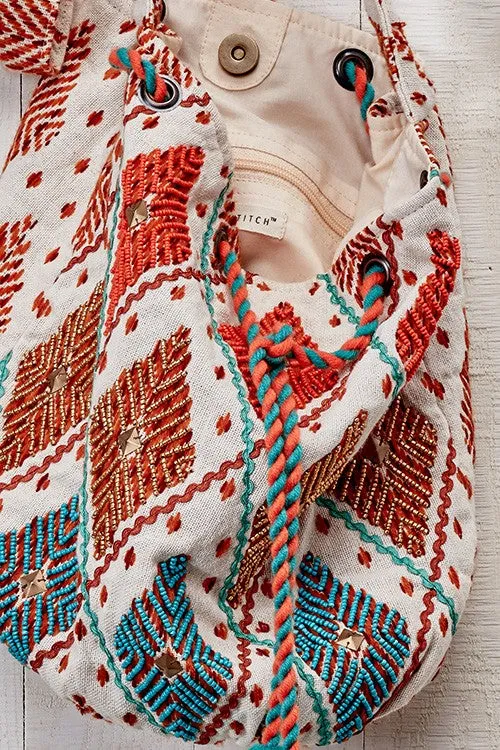 COCO TASSEL BUCKET BAG