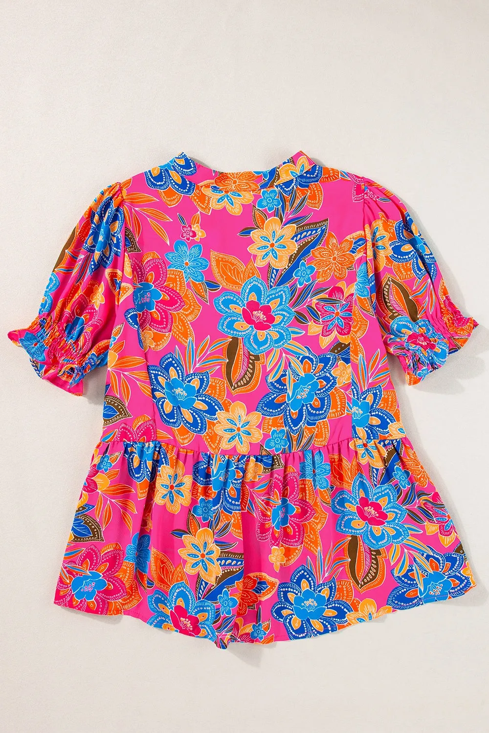 Kiara Peplum Printed Notched Short Sleeve Blouse