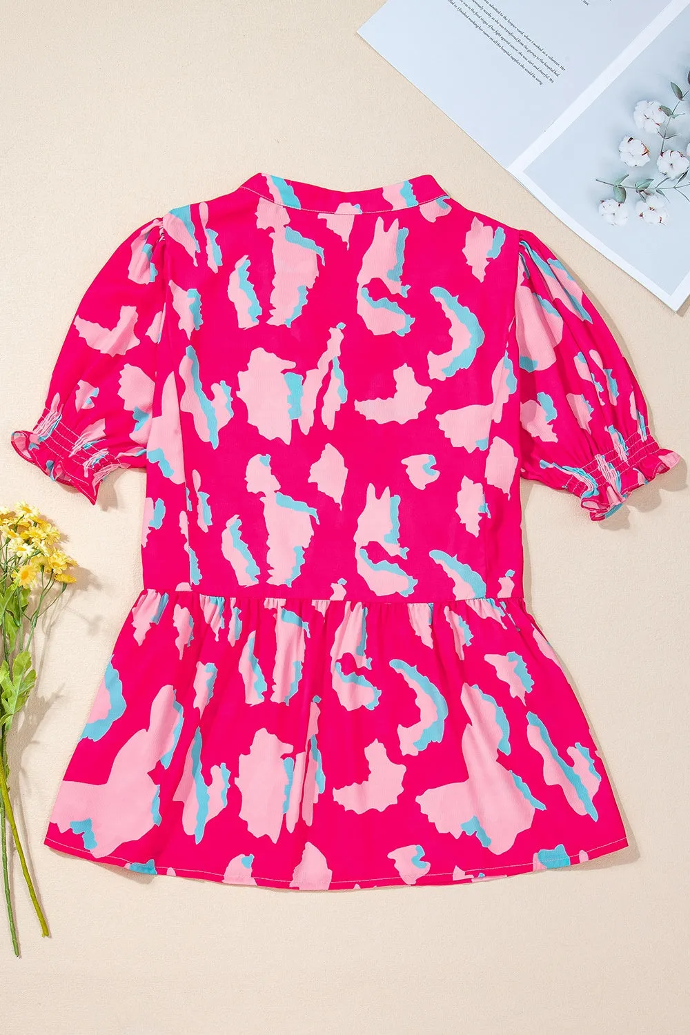 Kiara Peplum Printed Notched Short Sleeve Blouse