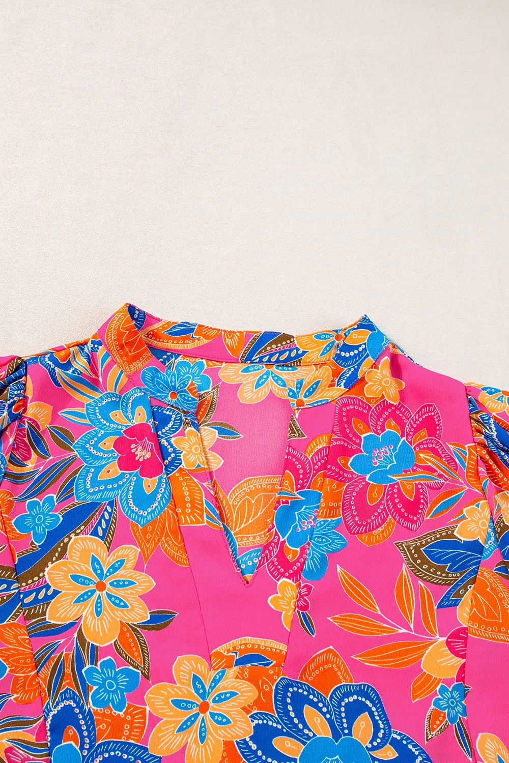 Kiara Peplum Printed Notched Short Sleeve Blouse