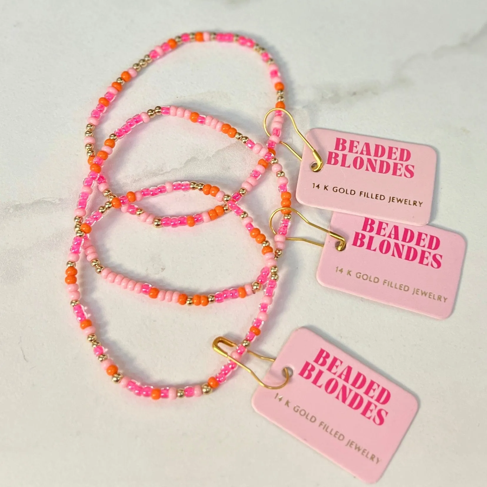 Pinks and Orange Sprinkle Beaded Bracelet: Standard 6.75 inch