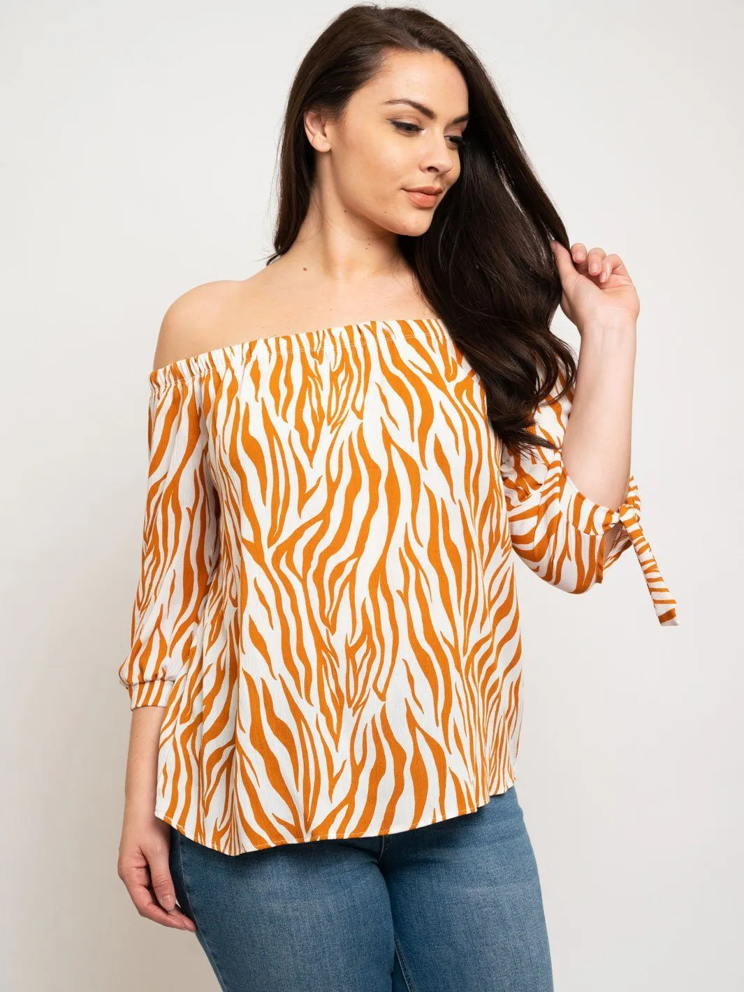PLUS SIZE OFF THE SHOULDER TOP