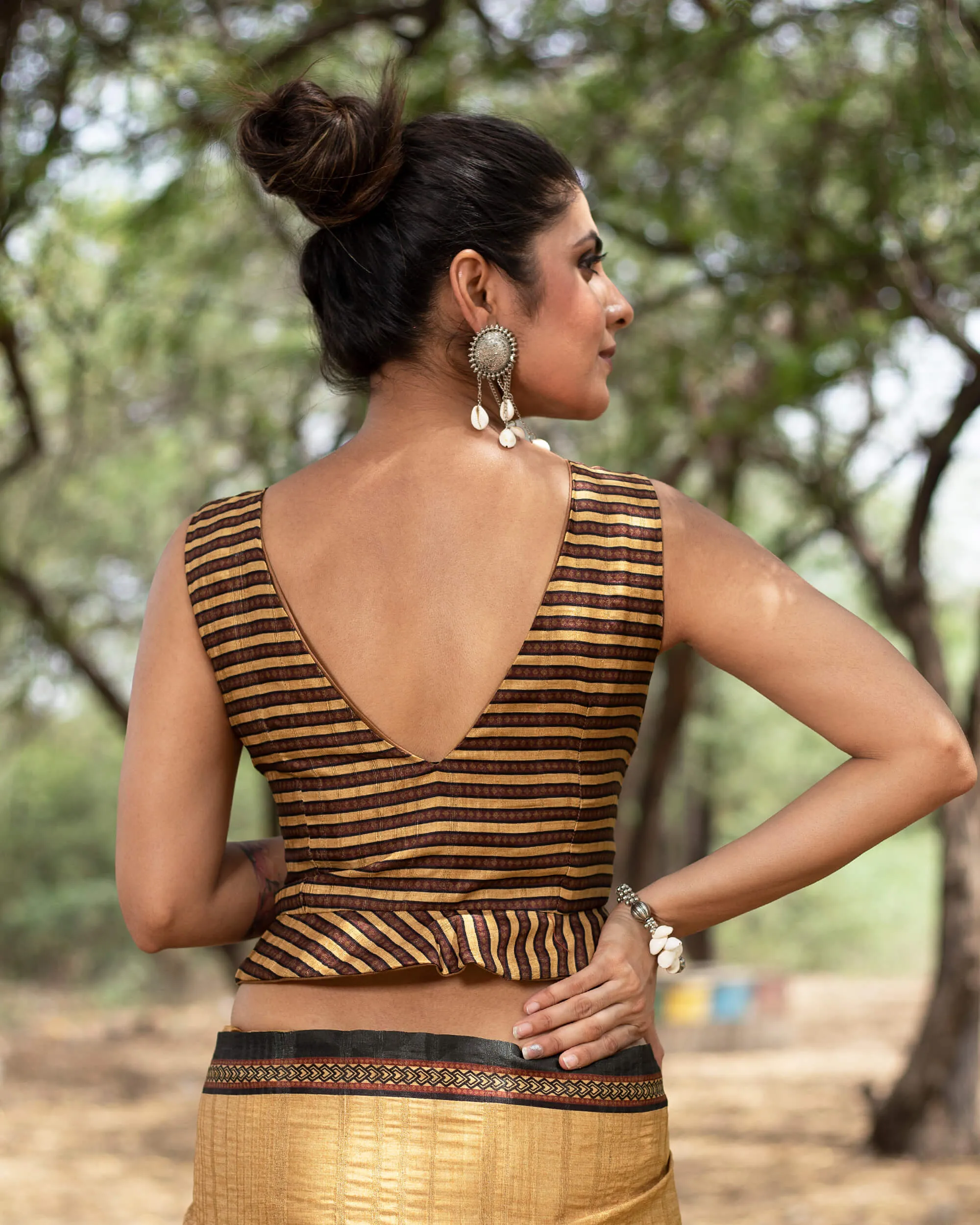 Stripes Printed Silk Peplum Blouse