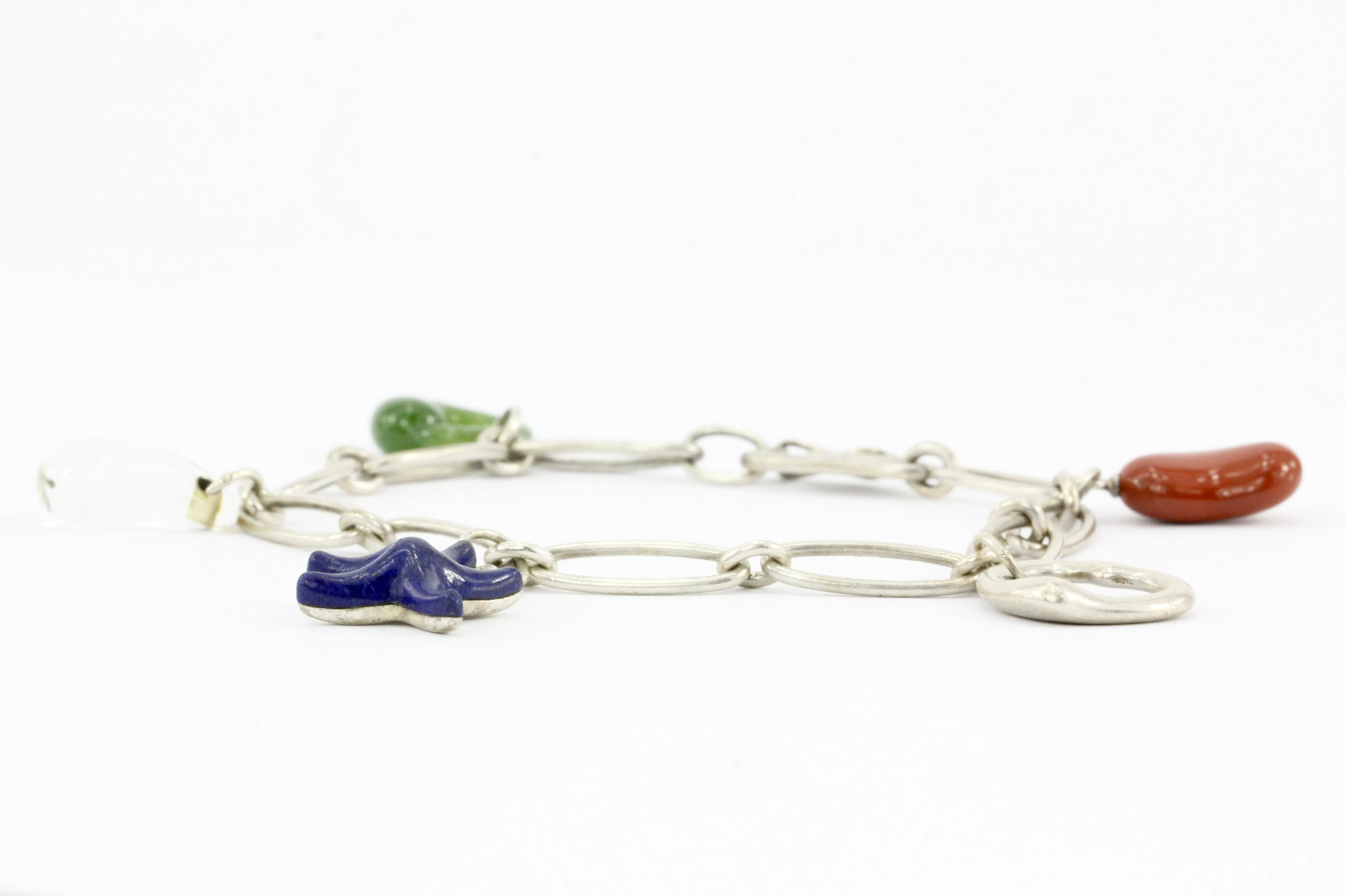 Tiffany & Co. Sterling Silver Multistage Five Charm Bracelet