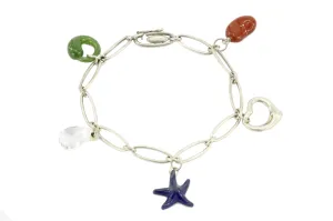 Tiffany & Co. Sterling Silver Multistage Five Charm Bracelet