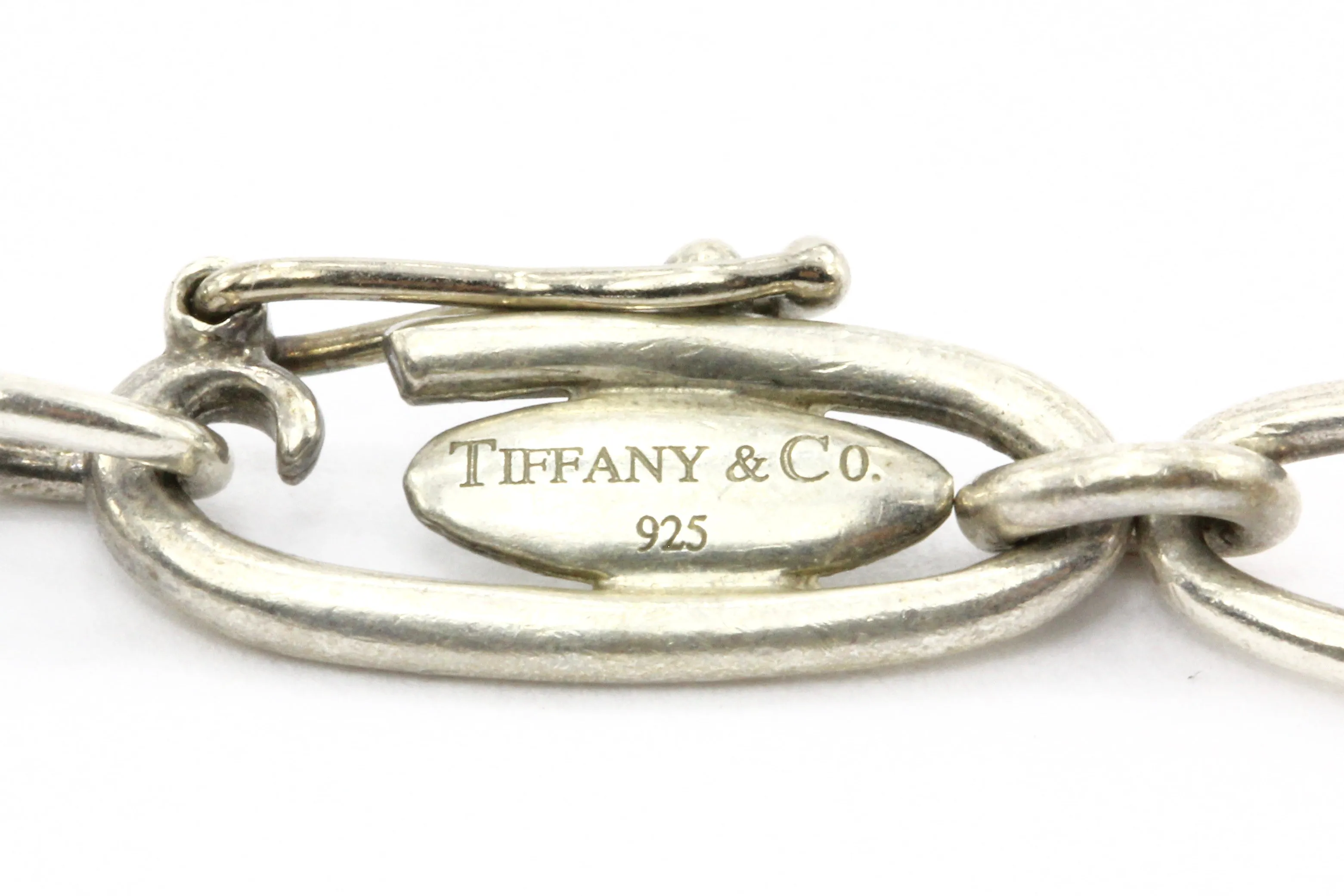 Tiffany & Co. Sterling Silver Multistage Five Charm Bracelet