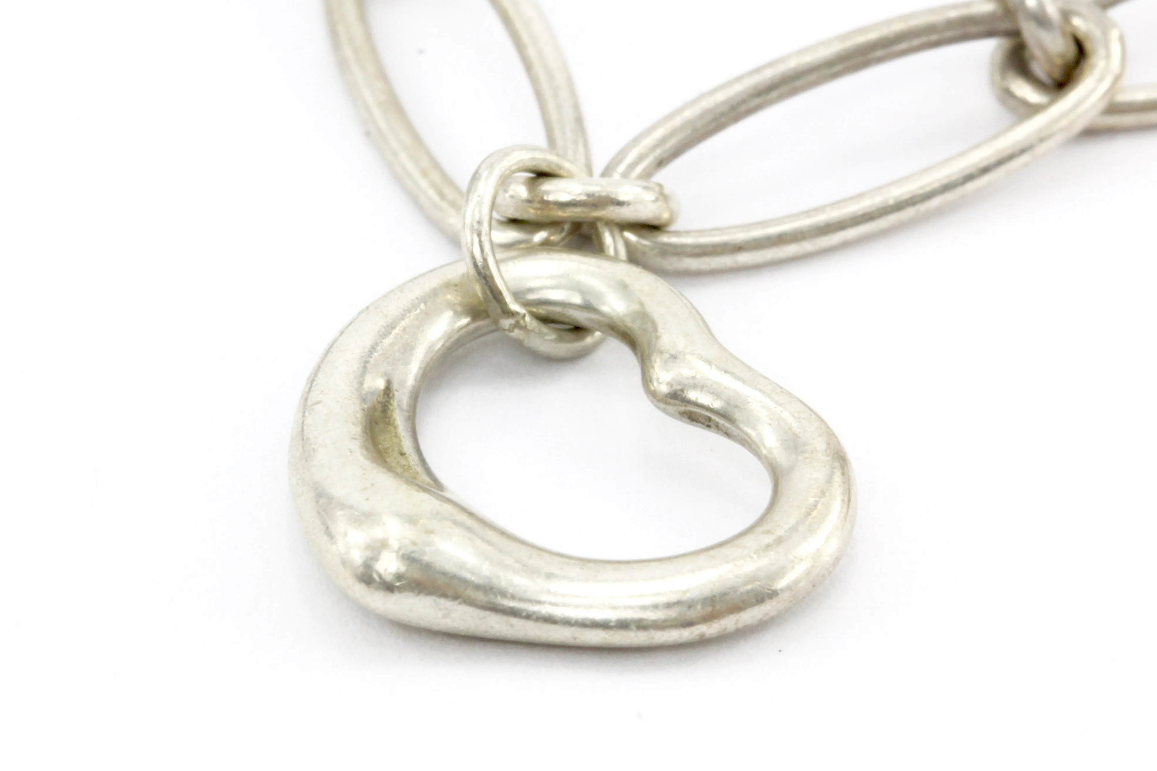 Tiffany & Co. Sterling Silver Multistage Five Charm Bracelet