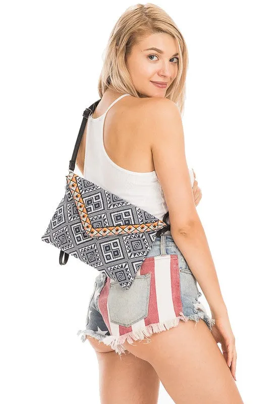 WANDERLUSTER PRINTED CLUTCH BAG